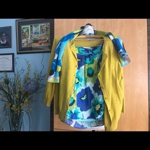 A set of cardigan, skirt and scarf